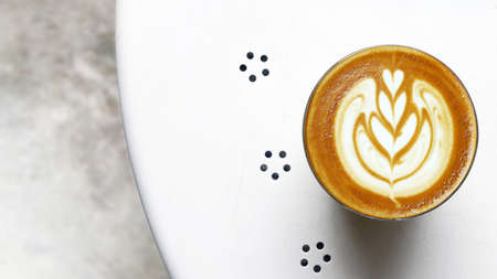 a cup of latte art coffee for background