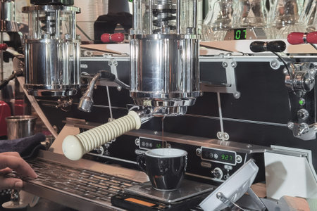 close up of coffee machine preparing cup of coffee