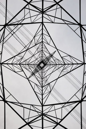 high voltage post.High-voltage tower sky background take with selective color technique and art lightingの写真素材