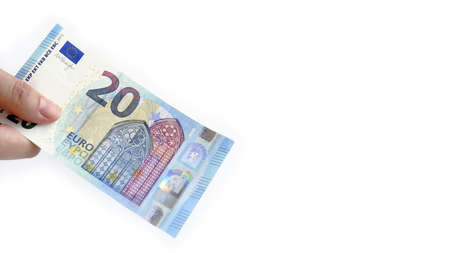 close up of banknote on hand isolated on white backgroundの写真素材