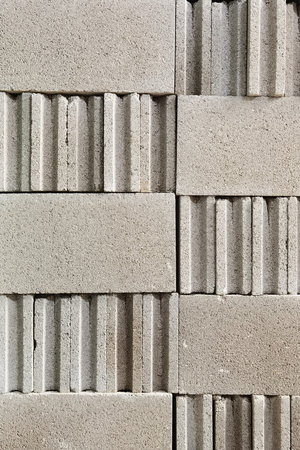 Pile of gray concrete bricks for background