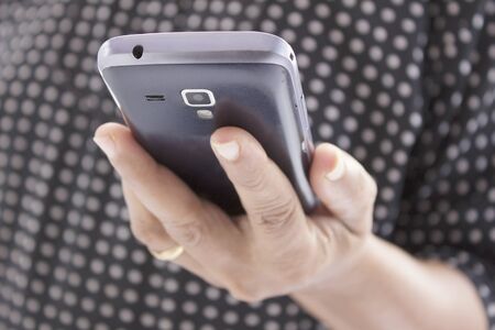 indian woman holding mobile