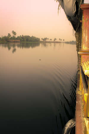 boat house sailing on the riverの写真素材