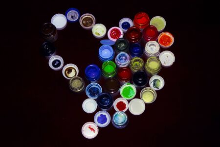 painting bottles in love heart shapeの写真素材