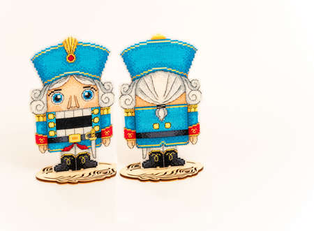 DIY. Embroidery. Handmade work. Tin soldier from the Nutcracker on a stand, front and back