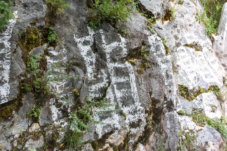 Drak Yerpa hiking route with white painted ledders on rocks so Gods can come downの写真素材