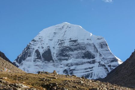 View on snowy slopes of mountain Kailash from pilgrimage trekking path around the mountain, Tibet, Asiaの写真素材