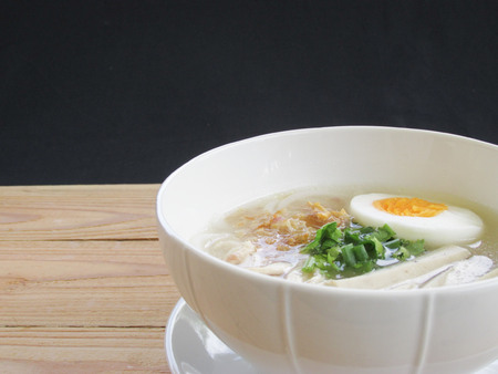 Vietnam noodle soup on wooden and black backgroudの写真素材