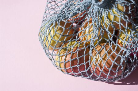 farm fruits in string knitted bag, healthy food, Eco friendly, zero waste, Close up, Copy space.