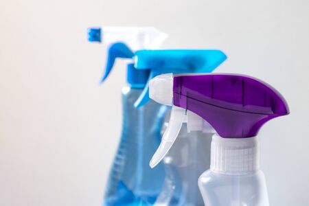 Top part of plastic sprayer, pulverizer mechanism, close up. Detergent. Bathroom cleaning.