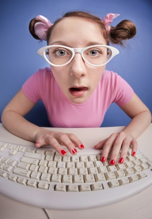 On line chatting, girl at the computerの写真素材