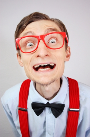 Excited cute nerd の写真素材