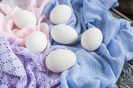 Chicken eggs on pastel background. Easter decoration.の写真素材