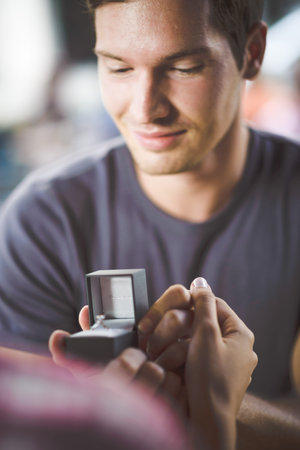 Engagement ring in cafe