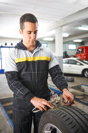 Mechanic Balancing car tyreの写真素材