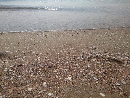 Beautiful bright blue seascape: sky, clouds, water, waves, sand, wind. Wonderfull vacation and...