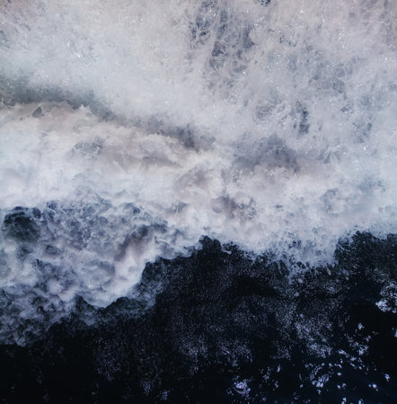 The sea white wave turns to foam. Background and texture. Place for text.