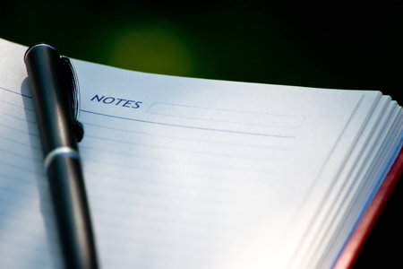 pen on organiser in nature