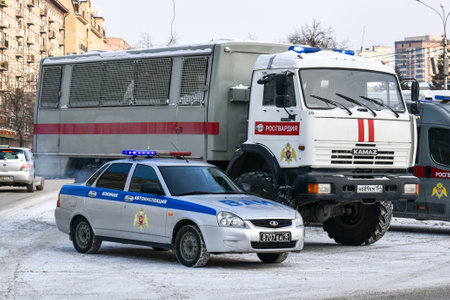 avtozak - car for transporting detained criminals. Action in support of Navalny. Russian police car stands on square with protesters. Protest action in city center. Novosibirsk, Russia-January 23, 2021のeditorial素材