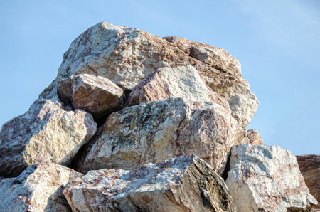 pile of stones. Rocks. Large decorative granite stones used in landscape design. stones against the...