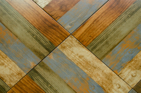 Texture of different motley boards laid diagonally. Background, corner parquet. laminate floorの写真素材