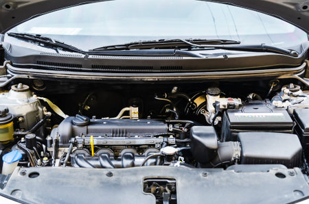 Car engine close-up. Close up of car parts under hood after maintenance and washing