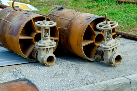 pipeline fittings at construction site for pipeline replacement. Steel gate valve, shut-off pipe...