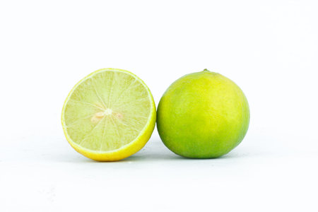 Lime are high in vitamin C vegetables fruit on the white background isolated