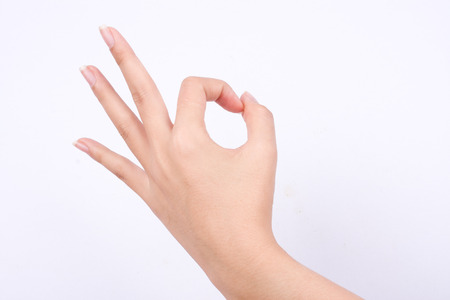 finger hand symbols isolated the concept hand gesturing sign ok okay agree on white backgroundの写真素材