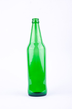 green beer bottle for beer beverage party on white background drink isolatedの写真素材