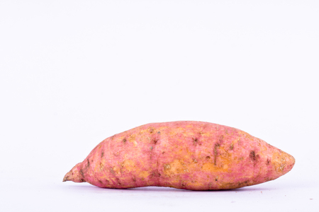 organic sweet potato yam on white background healthy fruit food isolatedの写真素材