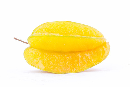 star fruit carambola or star apple ( starfruit ) on white background healthy fruit food isolated ( side view )の写真素材