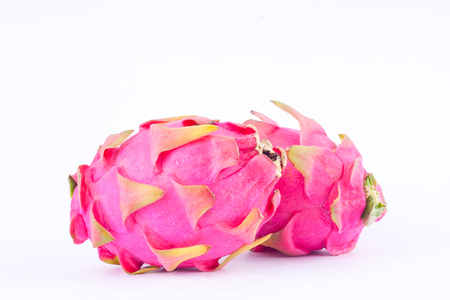 fresh   organic dragon fruit (dragonfruit) or pitaya on white background healthy fruit food isolatedの写真素材