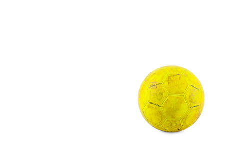 old yellow futsal ball created your health and relationship on white background football object isolatedの写真素材