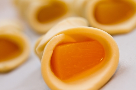 Dough puff pastry croissants prepared for bakingの写真素材