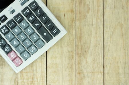 Calculator on wood pattern backgroundの写真素材