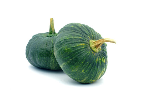 Double green pumpkin on white background. Two small green pumpkin on white background. object side view.の写真素材