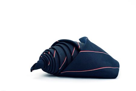 Dark blue necktie on white backgroundの写真素材