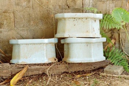 Old toilets with old wall pattern backgroundの写真素材