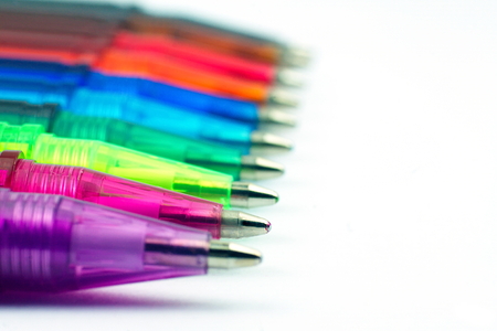 colorful ballpoint pen on white backgroundの写真素材