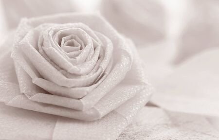 Fabric rose flower on blurred  background for Valentine festival. Retro style color effectの写真素材