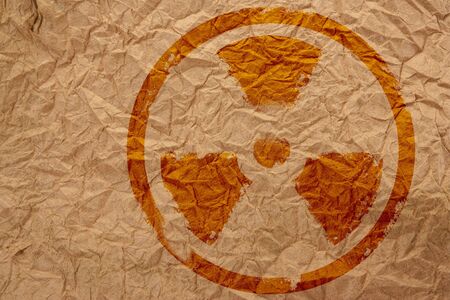 nuclear symbol on crumpled paperの写真素材