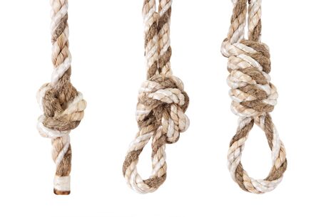 rope twisted in a knot is isolated on a white backgroundの写真素材