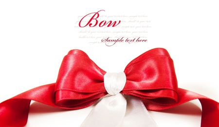 Gift red bow isolated on white backgroundの写真素材