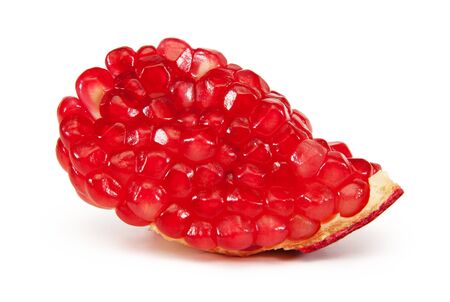 a slice of pomegranate isolated on white backgroundの写真素材