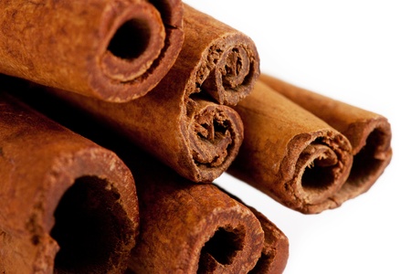 cinnamon sticks close-up. isolated on a white backgroundの写真素材