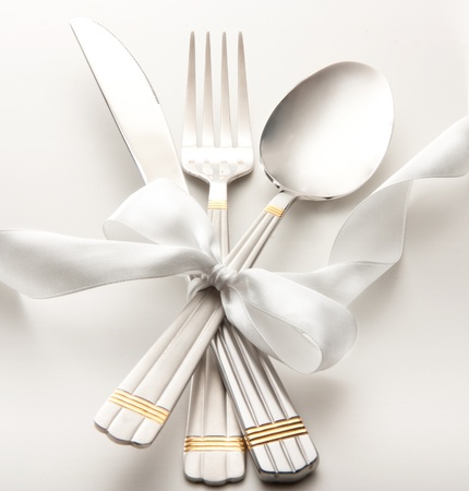 cutlery - knife, spoon and fork tied ribbonの写真素材