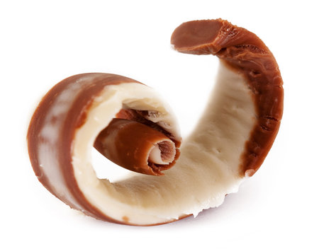 black and white chocolate in a curved shape. isolated on a white backgroundの写真素材