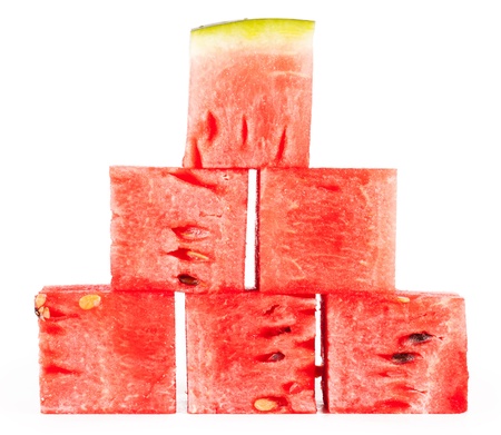 Cubes of watermelon  isolated on white backgroundの写真素材
