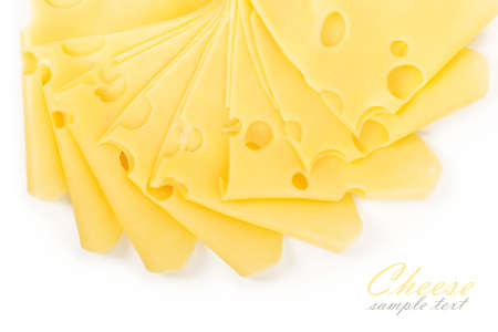 Cheese slices isolated on white backgroundの写真素材